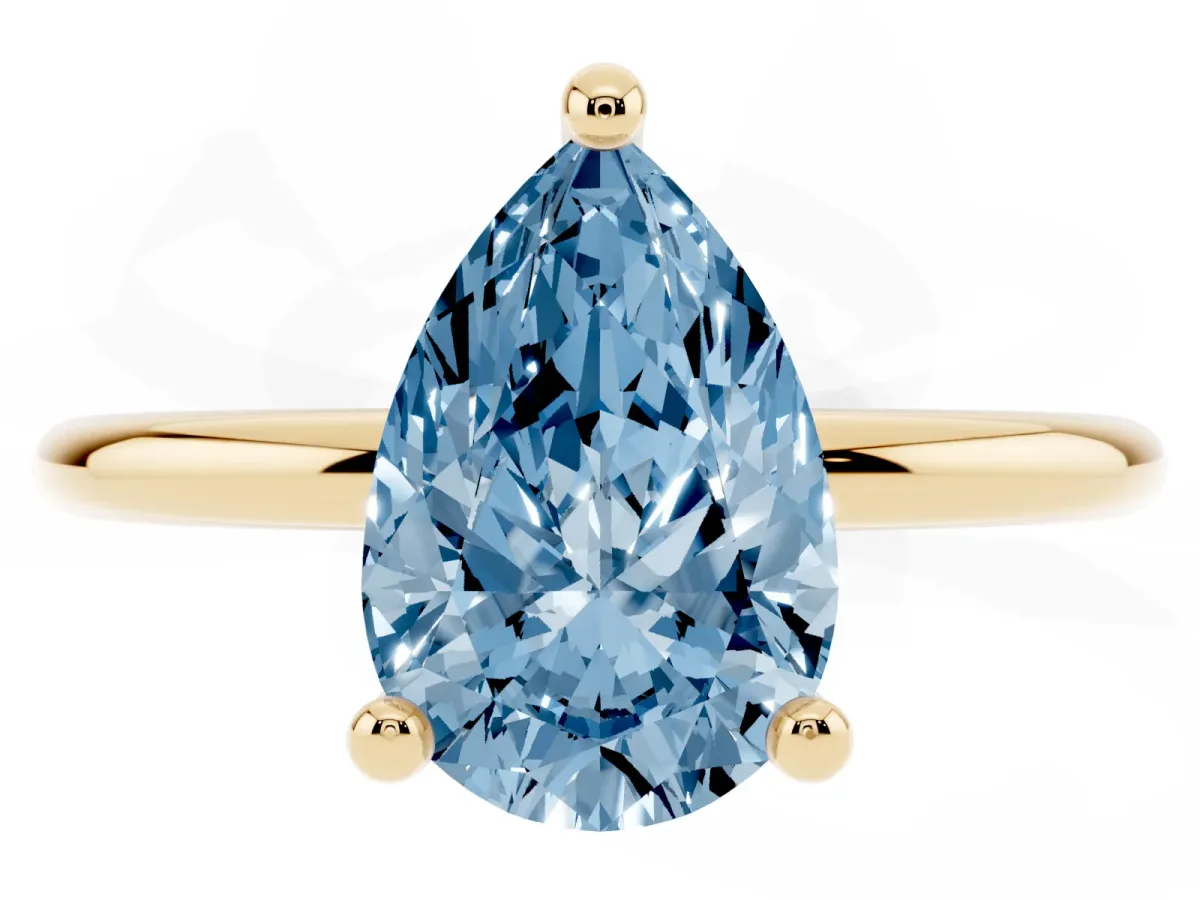 Fancy Blue Pear Cut Solitaire Diamond Ring with 4-Prong Setting on a Classic Band Yellow gold