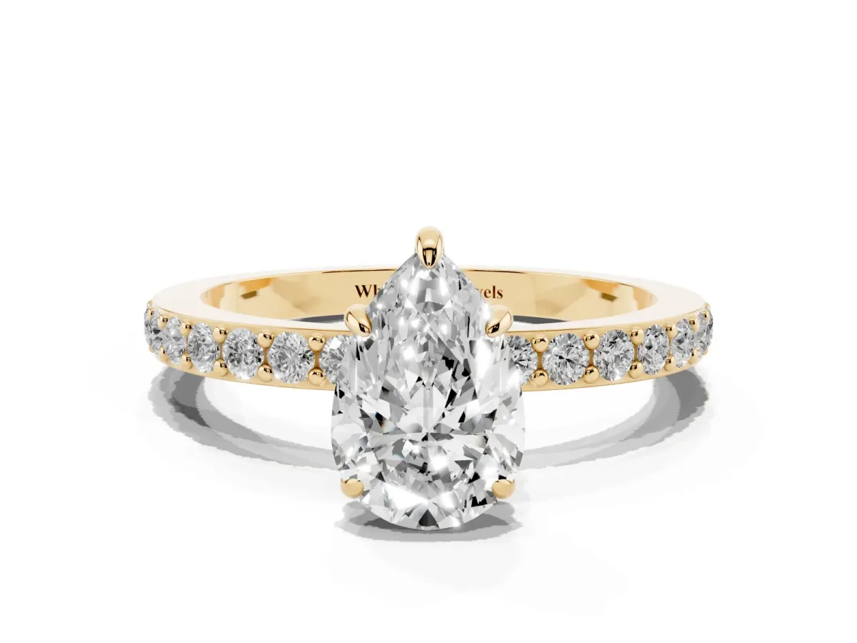 Pear Cut Diamond Pavé Engagement Ring with Round Accents and Prong Setting Yellow gold