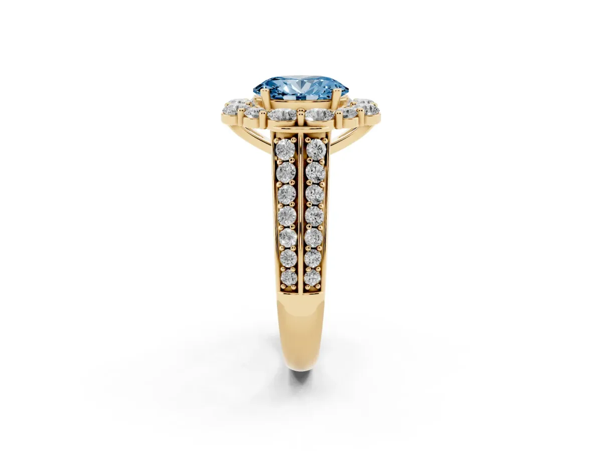Fancy Blue Oval Cut Halo Diamond Engagement Ring with Split Shank and Prong Setting Yellow gold