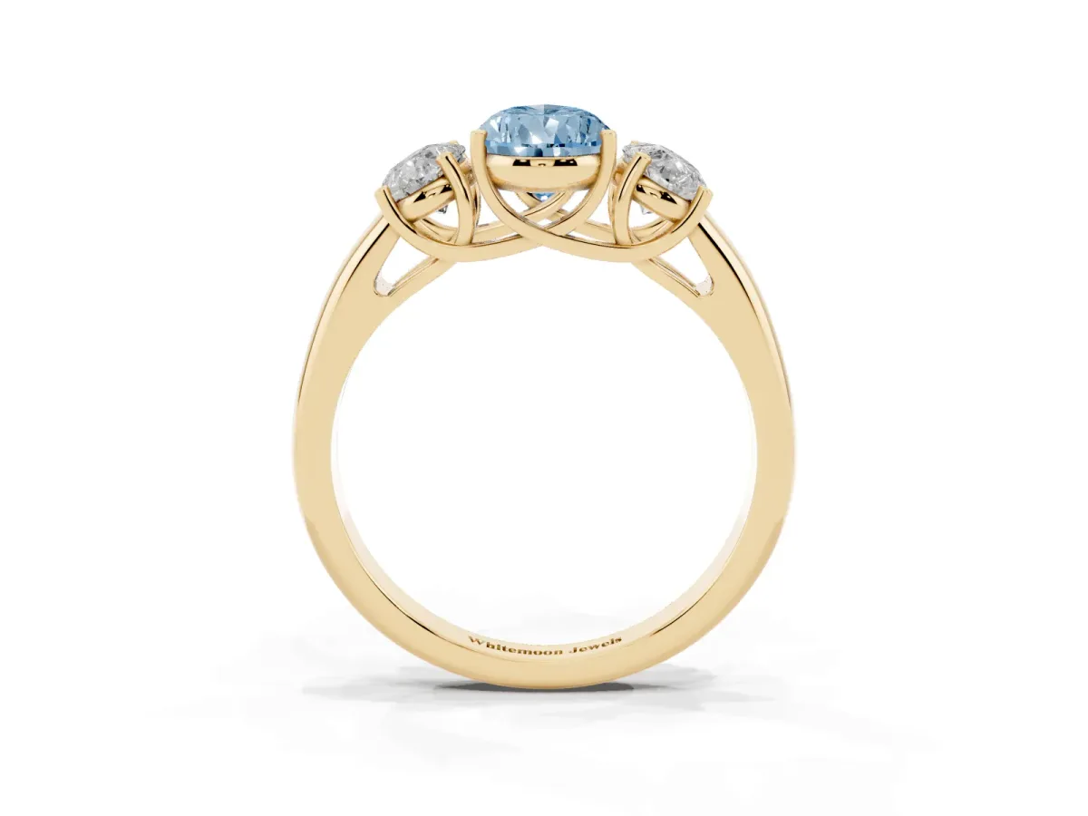 Fancy Blue Three-Stone Pear Cut Diamond Engagement Ring with Prong Setting Yellow gold