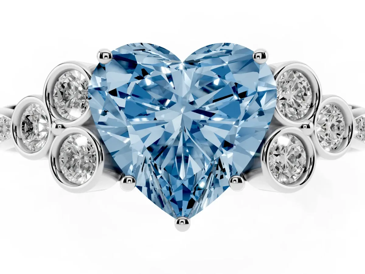 Fancy Blue Heart Cut Cut Diamond Engagement Ring with Bezel Set Round Side Stones and Prong Setting Silver