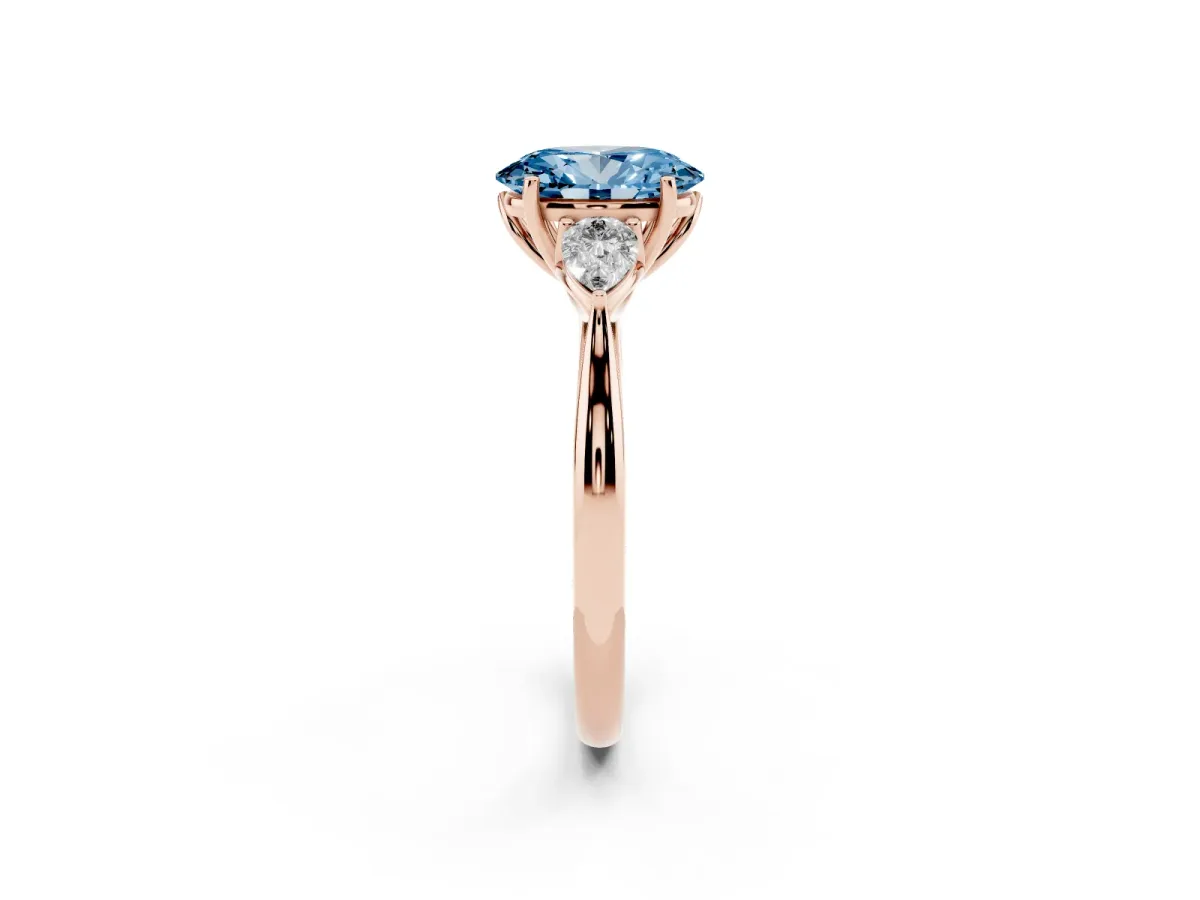 Fancy Blue Three-Stone Oval Cut Brilliant Diamond Solitaire Ring with Tapered Band and Four-Prong Setting Rose gold