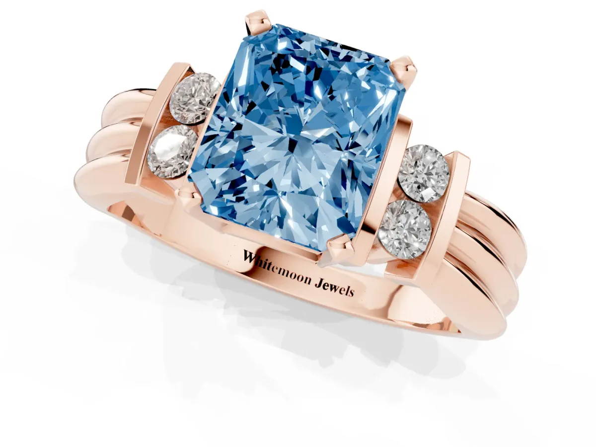 Fancy Blue Radiant Cut Cut Three-Stone Channel Set Ring with Bar Prongs Rose gold