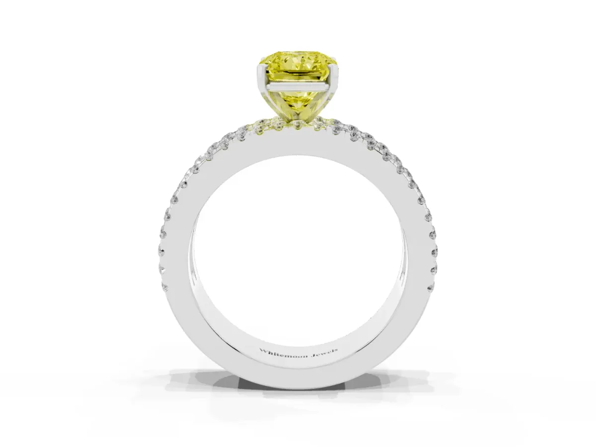 Fancy Yellow Radiant Cut Diamond Solitaire Ring with Pavé and Channel Set Band Platinum