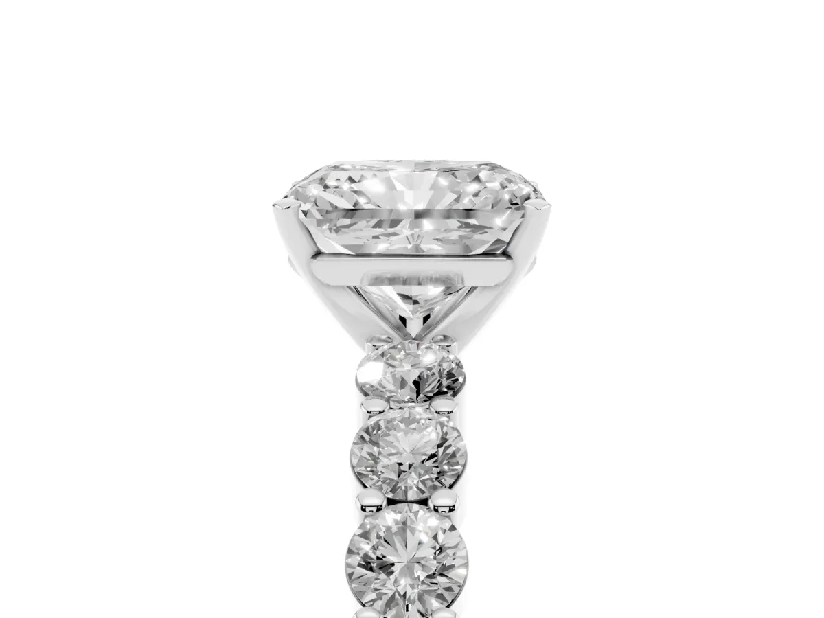 Radiant Cut Diamond Solitaire Ring with Shared Prong Round Side Stones Silver