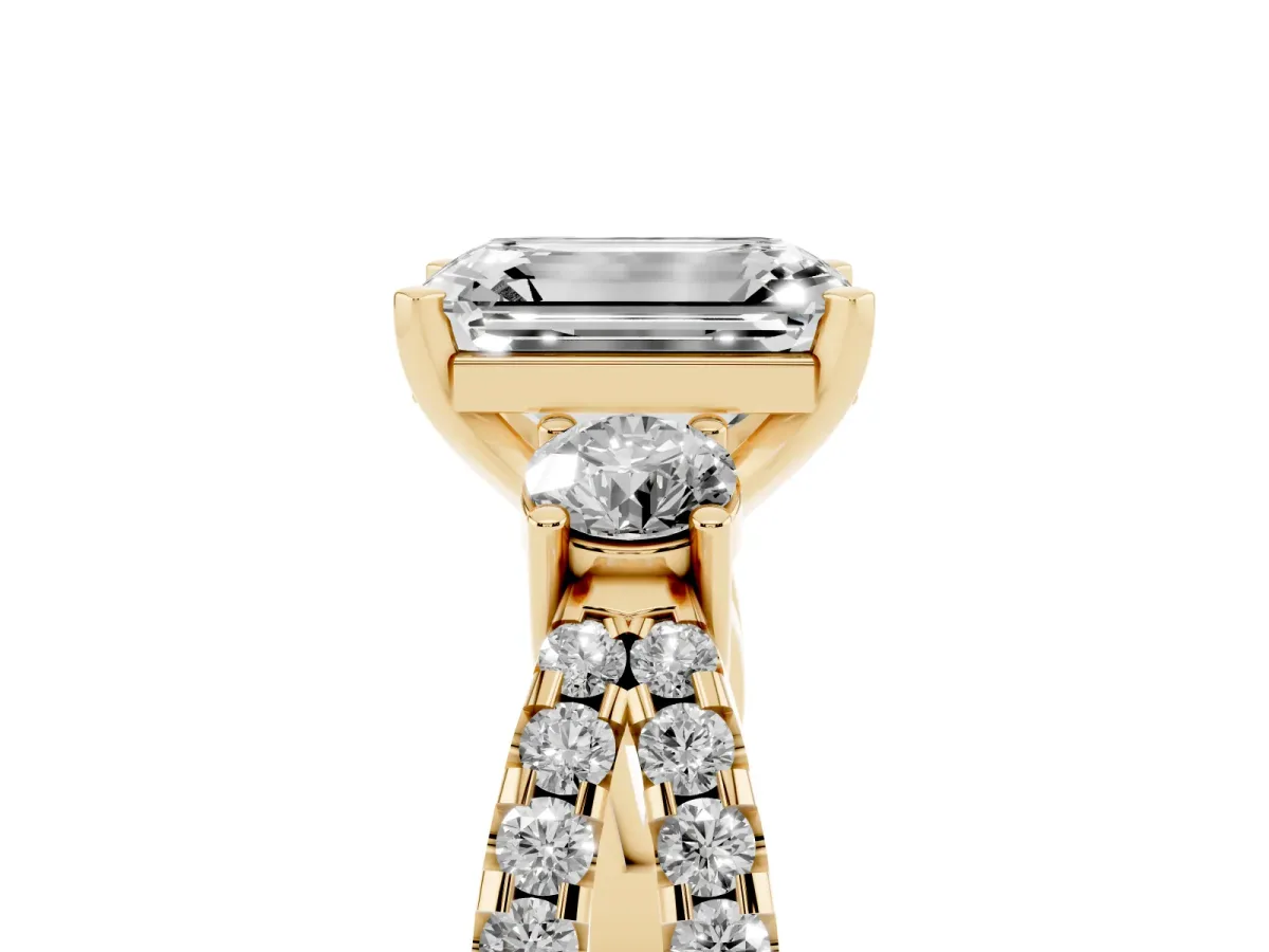 Emerald Cut Diamond Three-Stone Ring with Pavé Split Shank and Four-Prong Setting Yellow gold