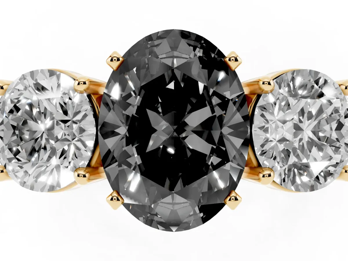 Fancy Black Three-Stone Oval Cut Diamond Ring with Round Side Stones, Classic Band, and Four-Prong Setting Yellow gold