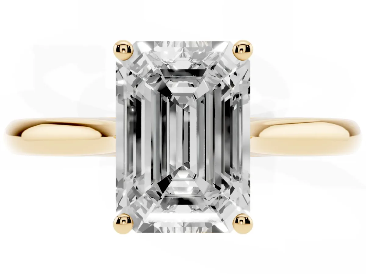 Emerald Cut Cut Solitaire Ring with Cathedral Band and Four-Prong Setting Yellow gold