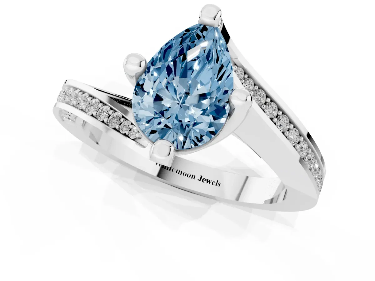 Fancy Blue Pear Cut Solitaire Diamond Twist Band with Pavé Setting and Four-Prong Setting Silver