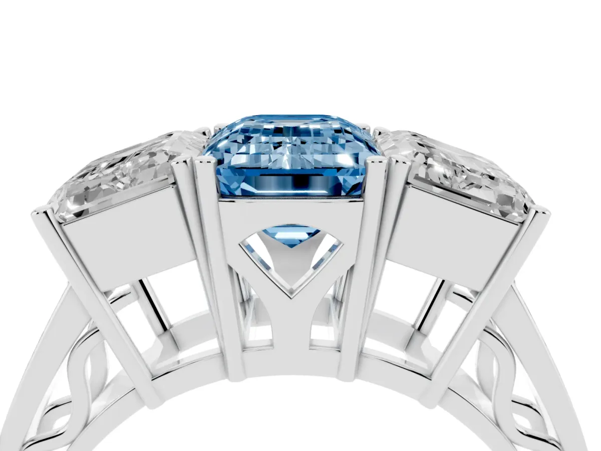 Fancy Blue Emerald Cut Diamond Three-Stone Ring with Prong Setting and Textured Band White gold