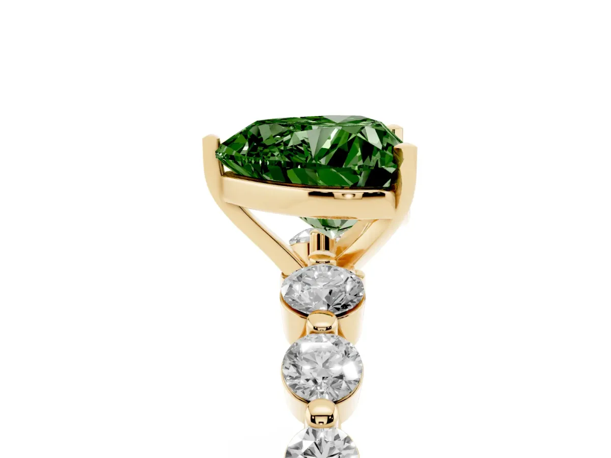 Fancy Green Heart Cut Solitaire Diamond Ring with Pave Band and Four-Prong Setting Yellow gold