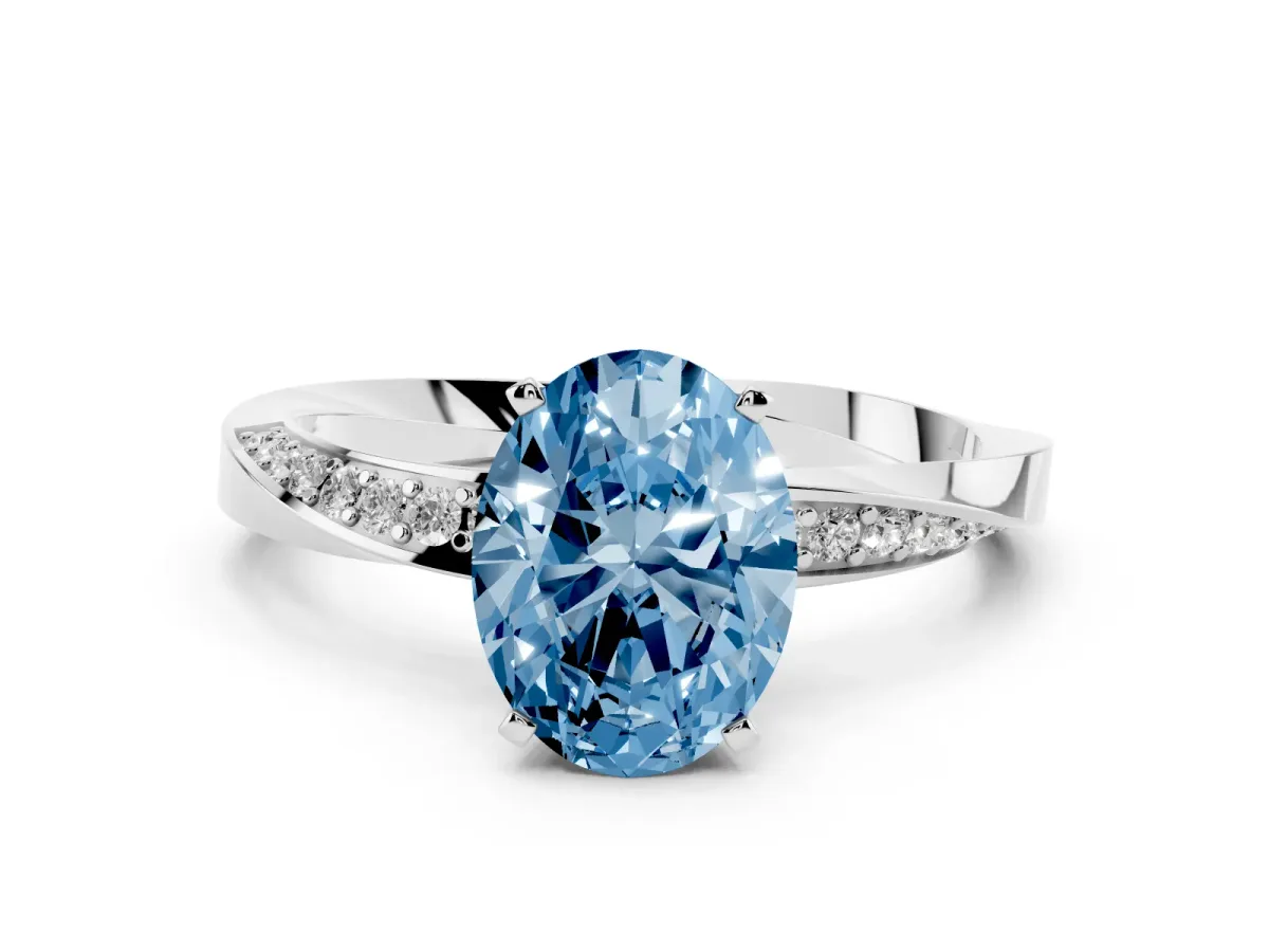 Fancy Blue Oval Cut Diamond Engagement Ring with Side Stone Accents and Four-Prong Setting Silver