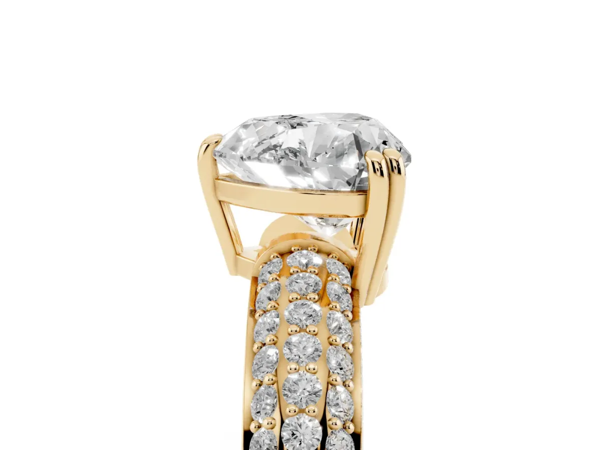 Heart Cut Diamond Solitaire Ring with Multi-Row Round Pavé Band and Prong Setting Yellow gold