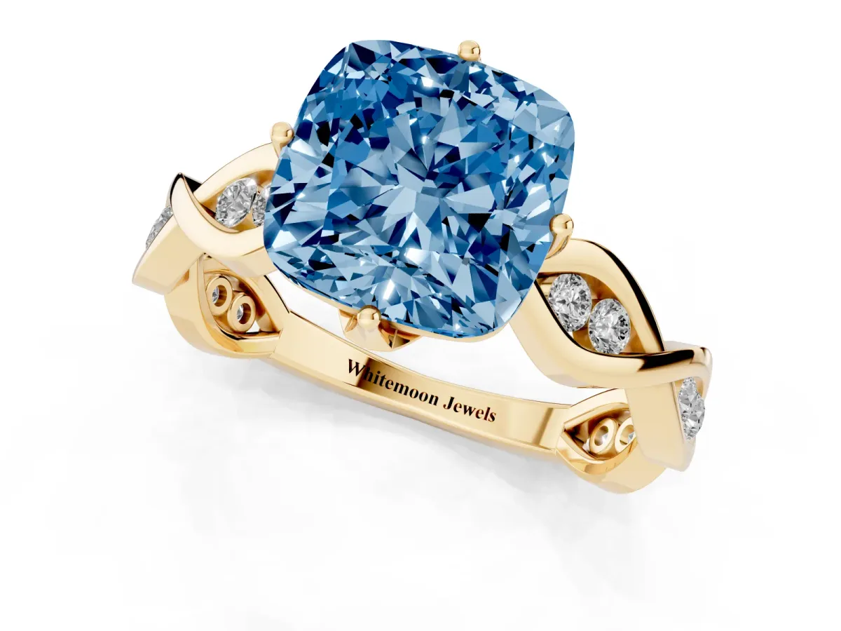 Fancy Blue Cushion Cut Solitaire Twist Band with Leaf Prong Setting Yellow gold