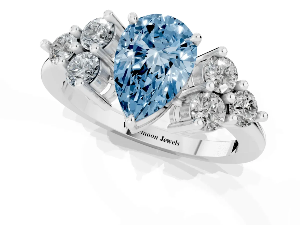 Fancy Blue Pear Cut Brilliant Diamond Cluster Accent Solitaire Ring with Prong Setting White gold