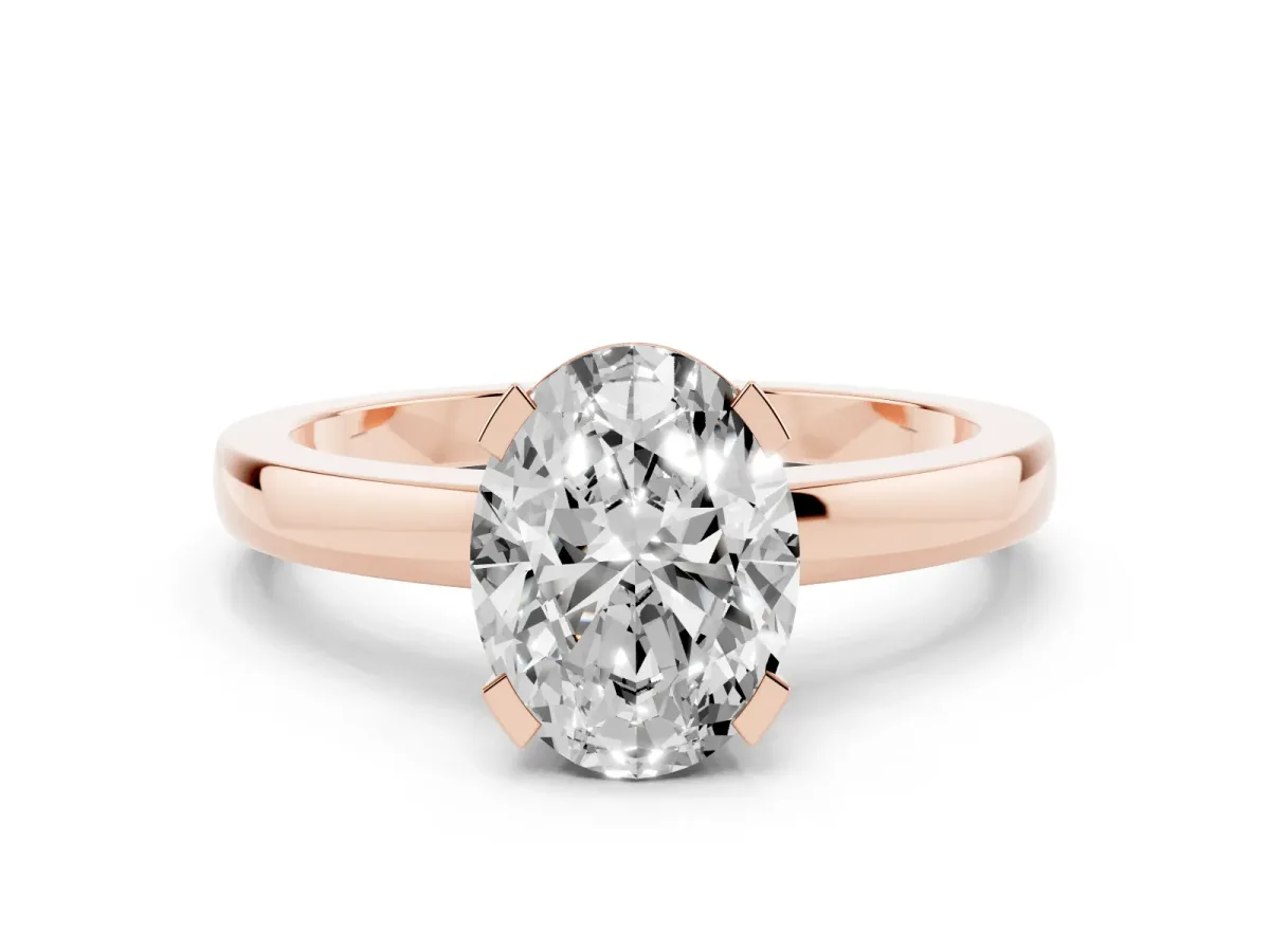 Oval Cut Cut Solitaire Ring with Four-Prong Setting and Classic Band Rose gold