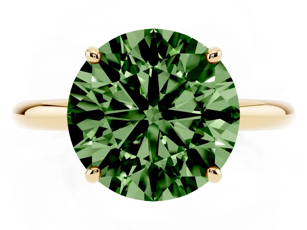 Fancy Green Round Cut Solitaire Diamond Ring with Four-Prong Setting on a Plain Band Yellow gold