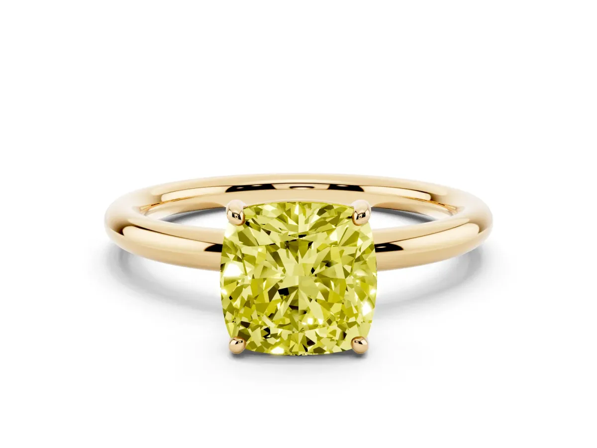 Fancy Yellow Cushion Cut Solitaire Diamond Ring with Four-Prong Setting on a Plain Band Yellow gold