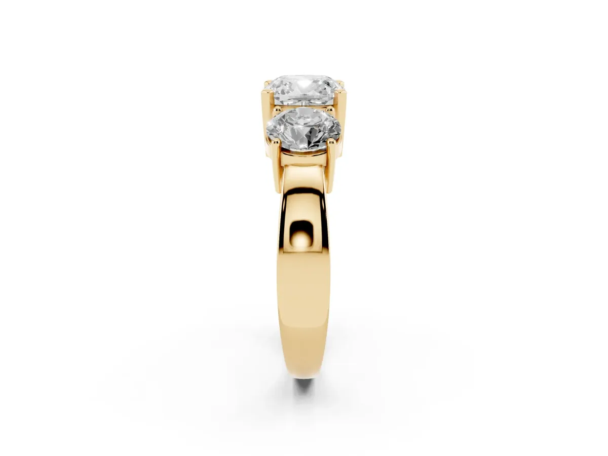 Three-Stone Cushion Cut Diamond Ring with Round Side Stones, Classic Band, and Four-Prong Setting Yellow gold