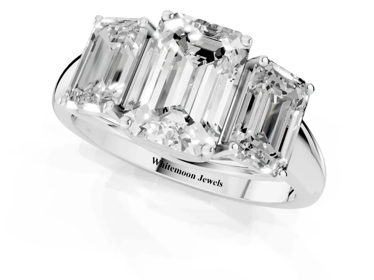 Three-Stone Emerald Cut Diamond Engagement Ring with Prong Setting Platinum