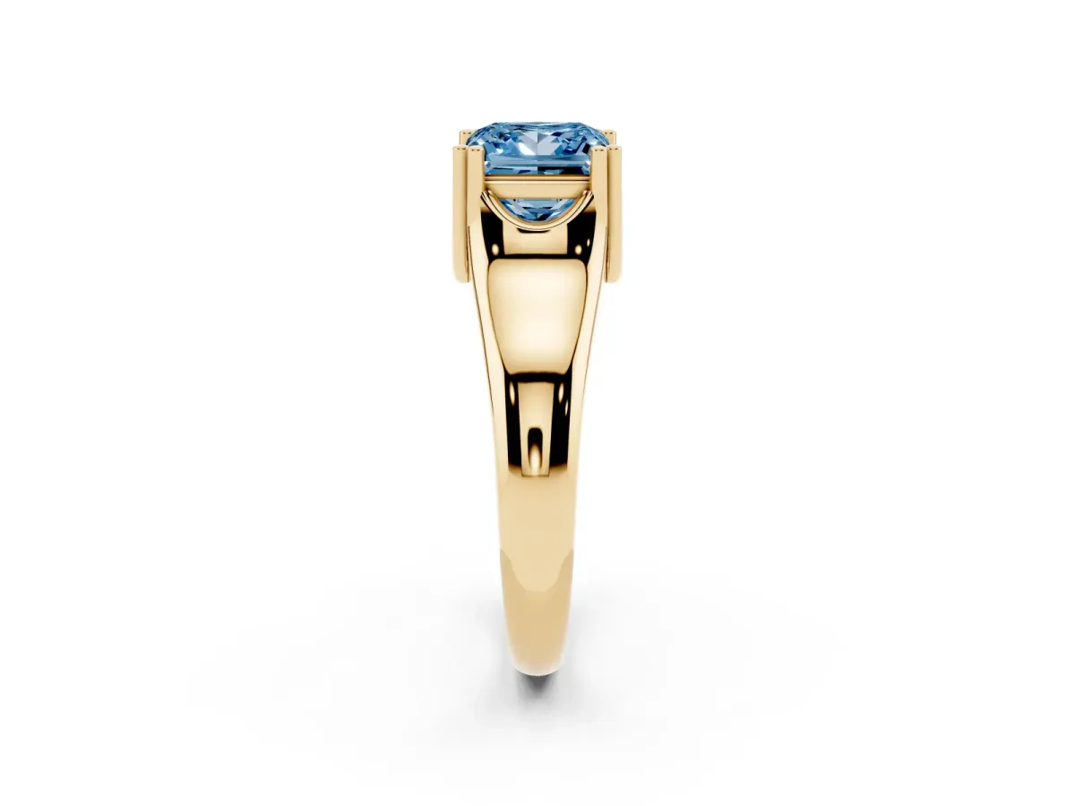 Fancy Blue Princess Cut Diamond Solitaire Ring with Wide Band and Prong Setting Yellow gold