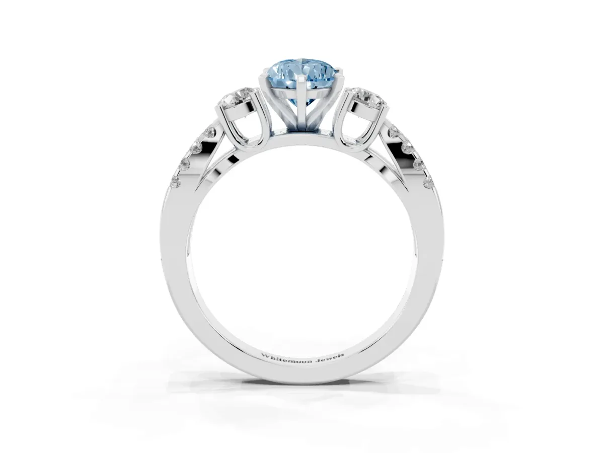 Fancy Blue Pear Cut Diamond Three-Stone Ring with Pavé Split Shank and Four-Prong Setting Silver
