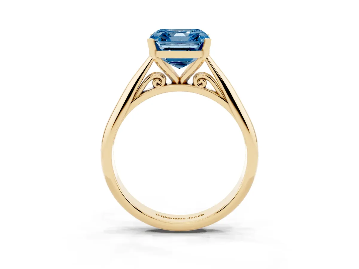 Fancy Blue Asscher Cut Diamond Solitaire Engagement Ring with Cathedral Setting and Four-Prong Mount Yellow gold