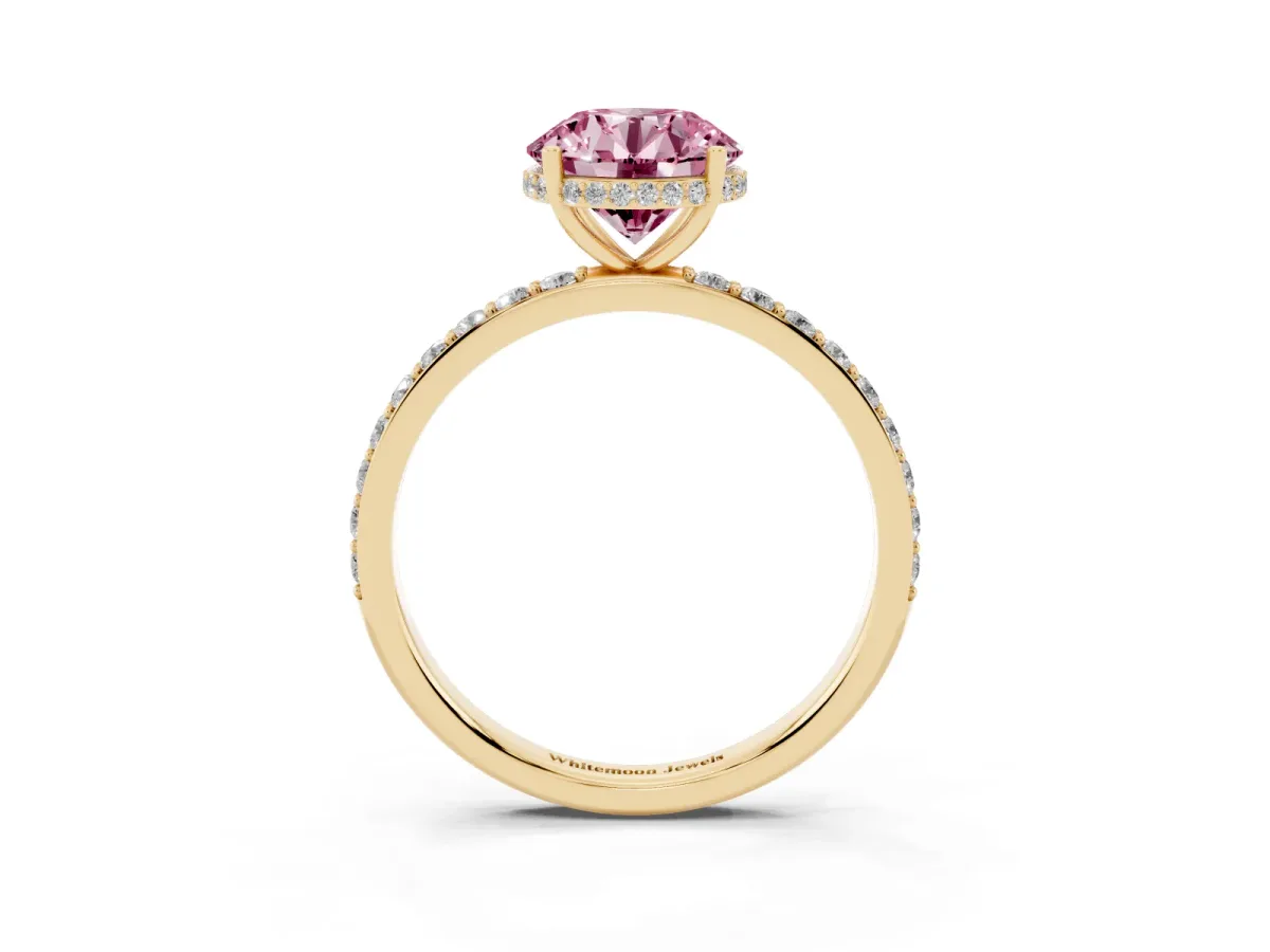 Fancy Pink Round Cut Diamond Solitaire Ring with Pavé Band and Hidden Halo Yellow gold