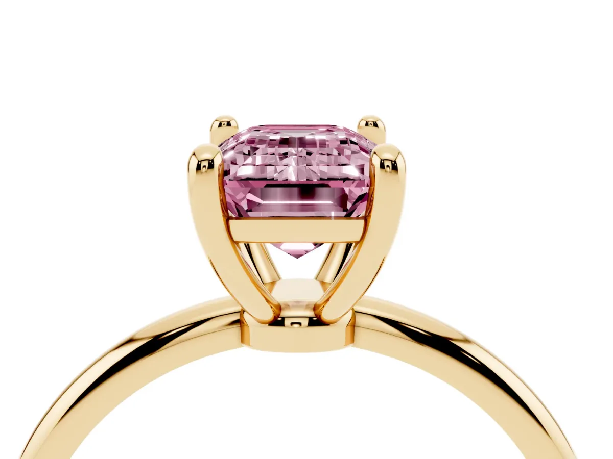 Fancy Pink Emerald Cut Solitaire Diamond Ring with 4-Prong Setting on a Classic Band Yellow gold