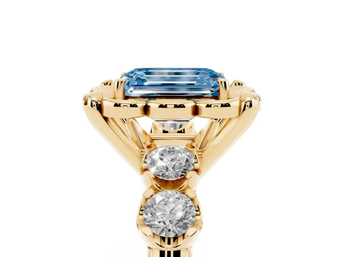 Fancy Blue Emerald Cut Cut Diamond Floral Halo Engagement Ring with Shared Prong Setting Yellow gold
