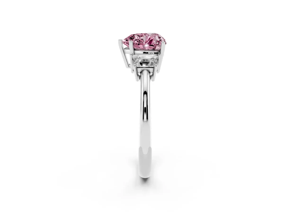 Fancy Pink Heart Cut Diamond Three-Stone Ring with Trapezoid Side Stones and Prong Setting Silver