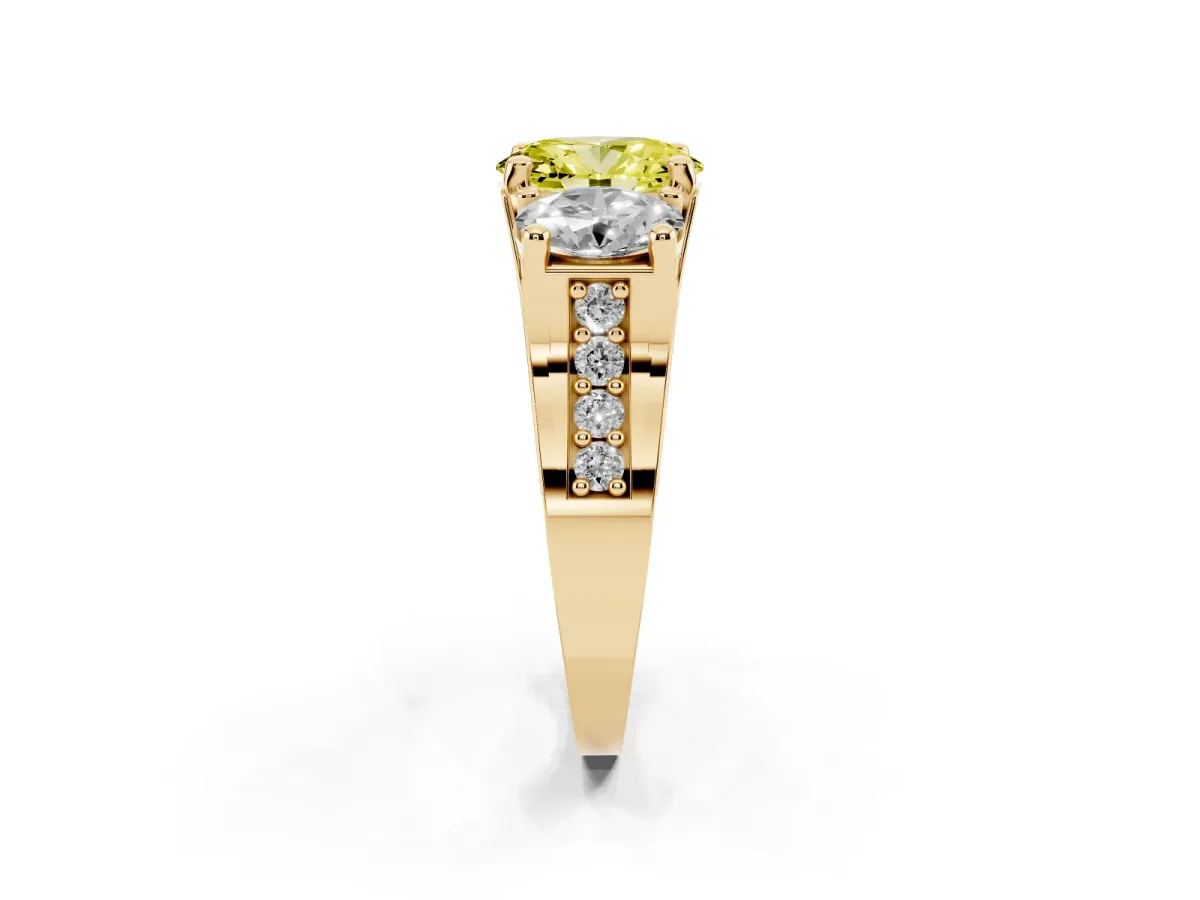 Fancy Yellow Oval Cut Diamond Three-Stone Ring with Channel Set Band and Four-Prong Setting Yellow gold
