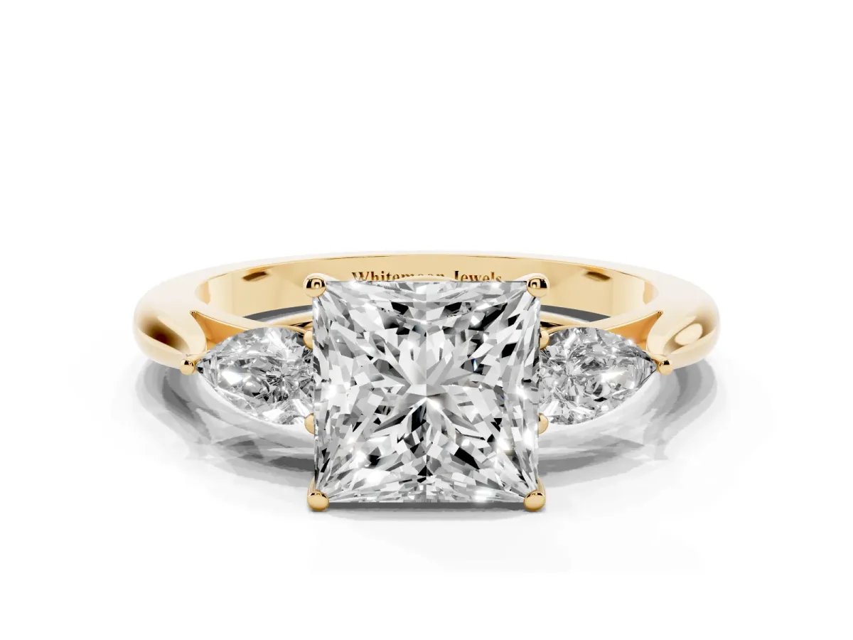 Three-Stone Princess Cut Brilliant Diamond Solitaire Ring with Tapered Band and Four-Prong Setting Yellow gold
