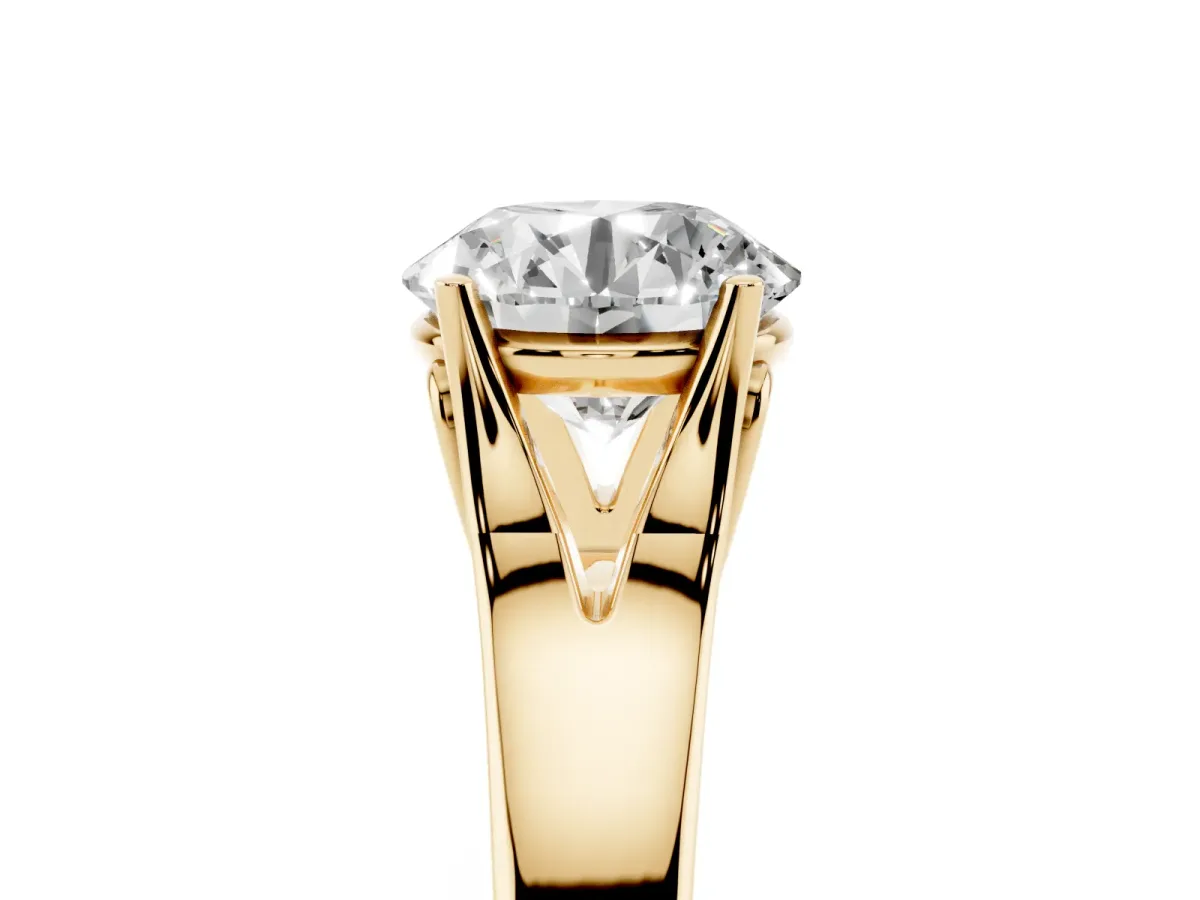 Round Cut Solitaire Diamond Ring with Cathedral Band and Four-Prong Setting Yellow gold