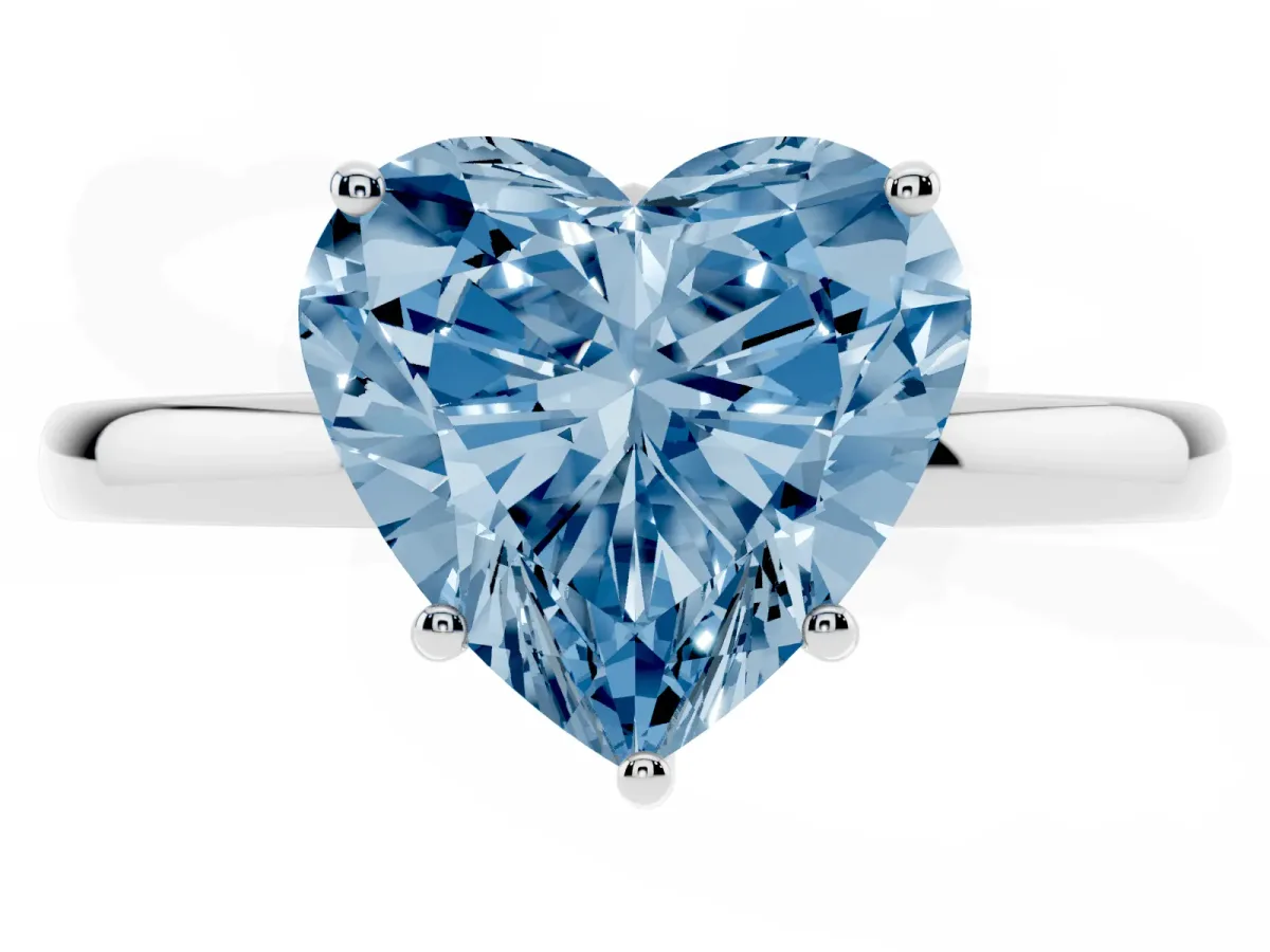 Fancy Blue Heart Cut Solitaire Diamond Ring with Prong Setting and Plain Band Silver