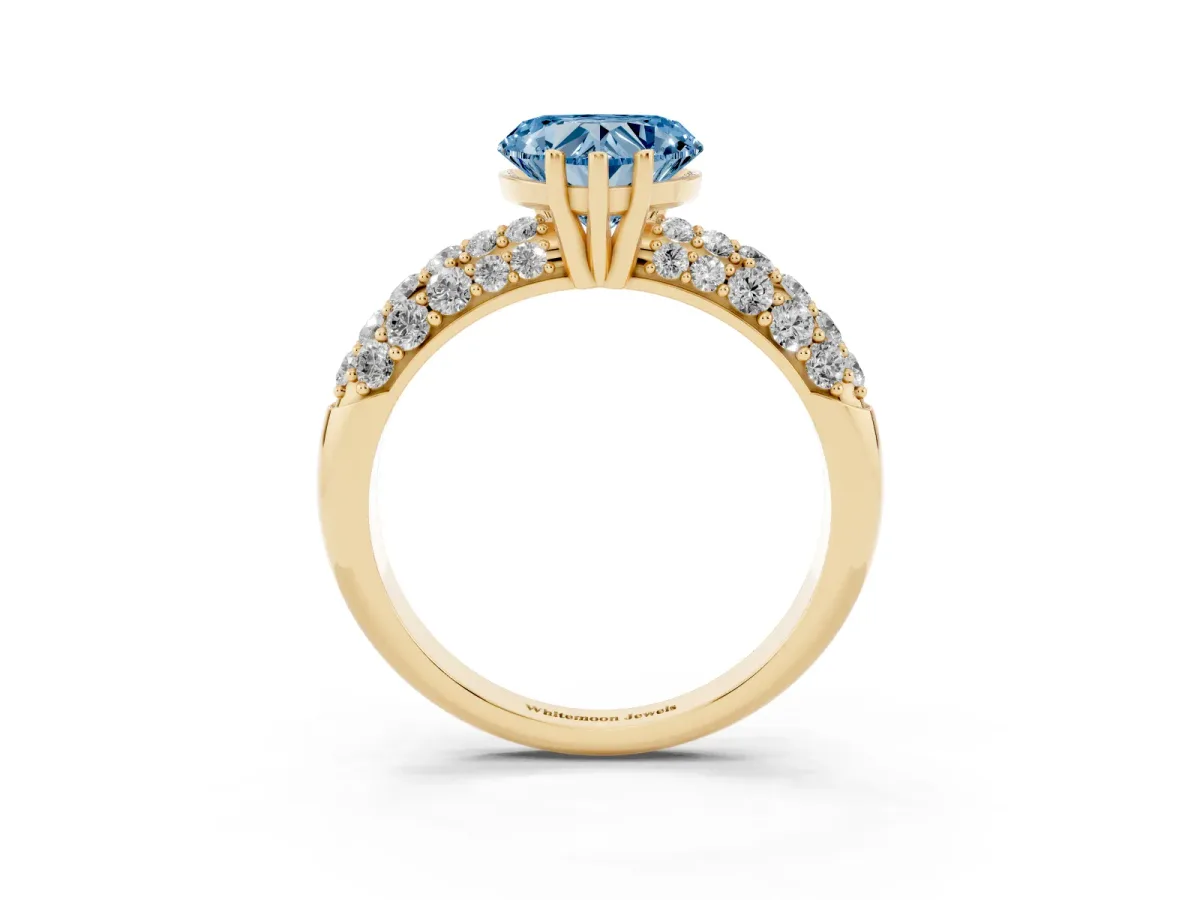 Fancy Blue Heart Cut Diamond Pavé Band Solitaire Ring with Four-Prong Setting Yellow gold