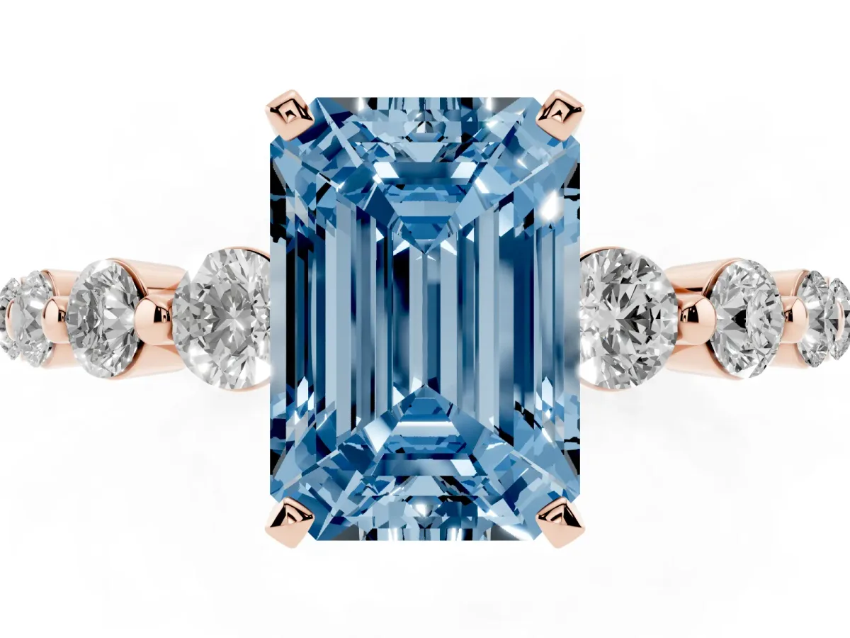 Fancy Blue Emerald Cut Solitaire Diamond Ring with Pave Band and Four-Prong Setting Rose gold