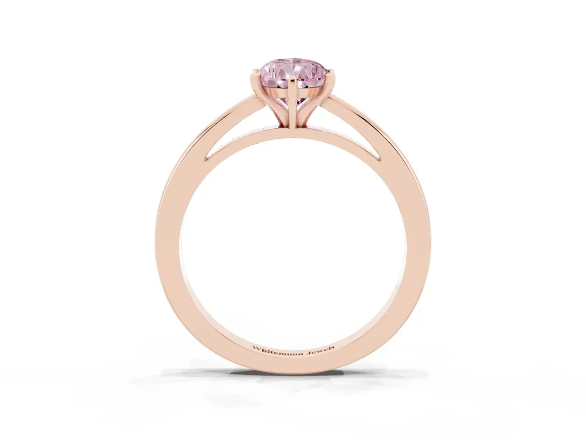 Fancy Pink Pear Cut Solitaire Diamond Engagement Ring with Four-Prong Setting on a Classic Band Rose gold