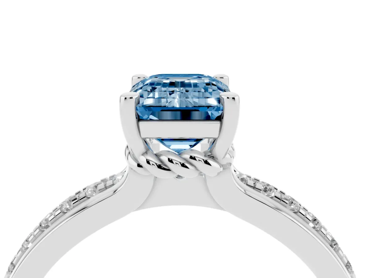 Fancy Blue Emerald Cut Solitaire Diamond Ring with Channel Set Band and Six-Prong Setting Silver