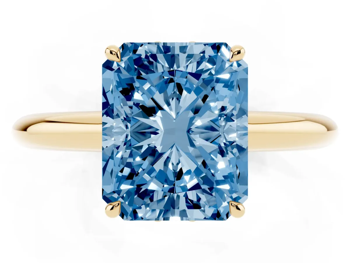 Fancy Blue Radiant Cut Brilliant Solitaire Engagement Ring with Six-Prong Setting and Classic Band Yellow gold
