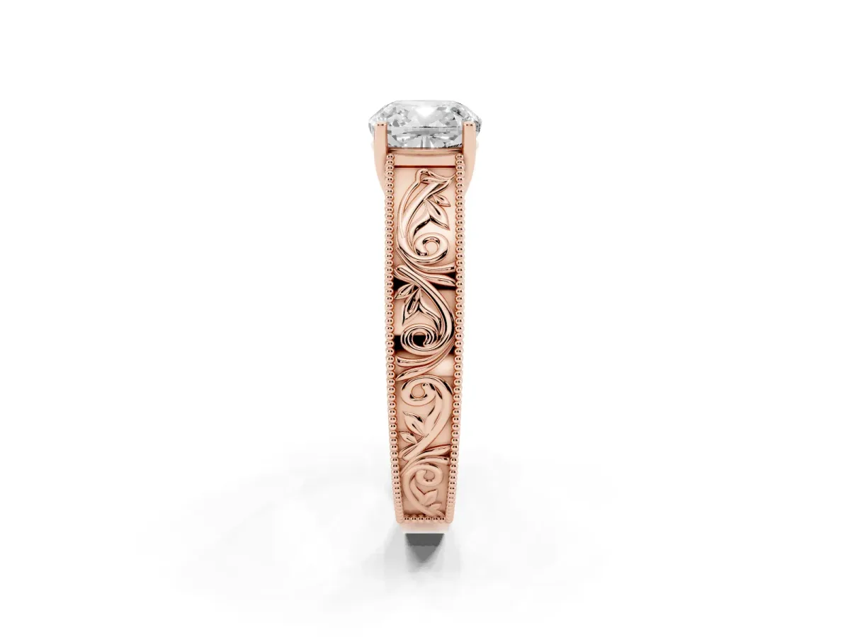 Cushion Cut Diamond Solitaire Ring with Engraved Band and Four-Prong Setting Rose gold