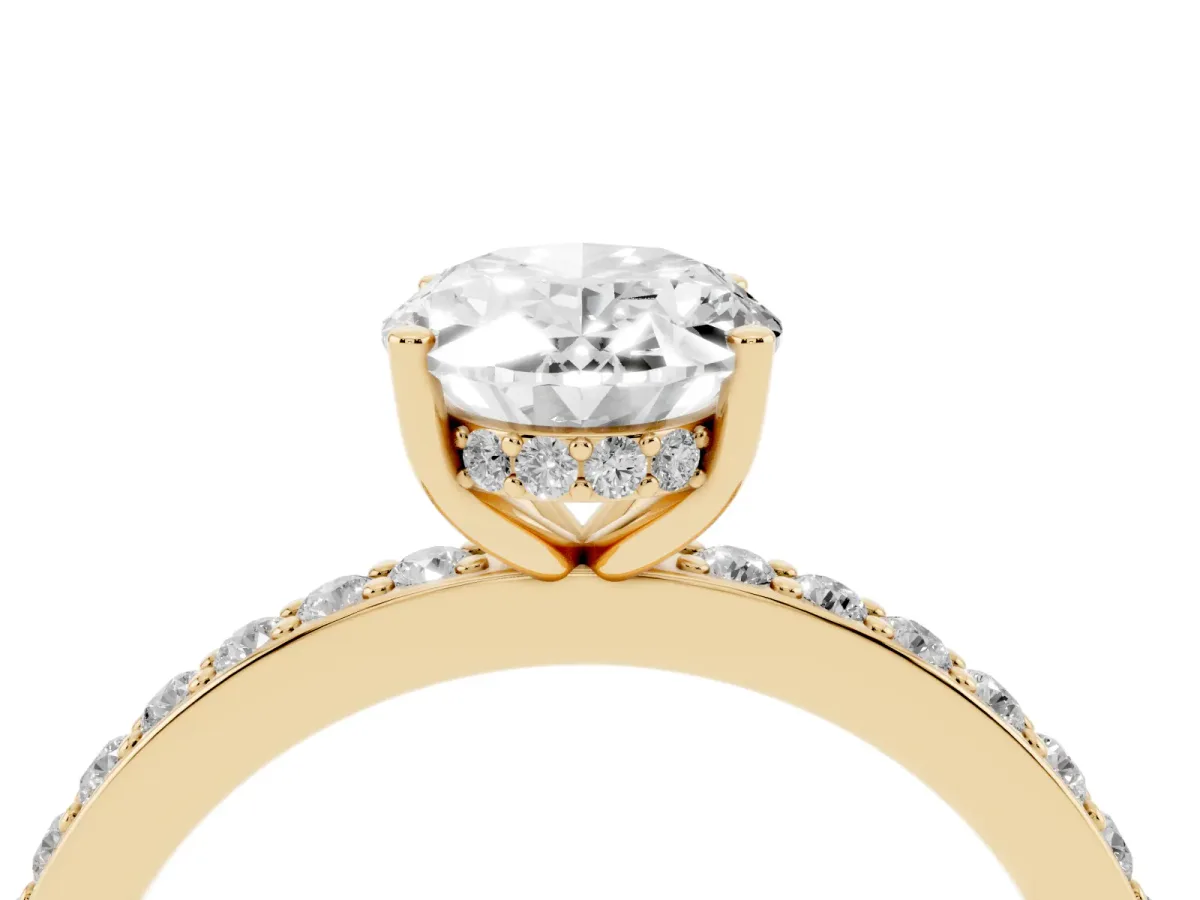 Oval Cut Cut Diamond Pavé Band Ring with Four-Prong Setting Yellow gold