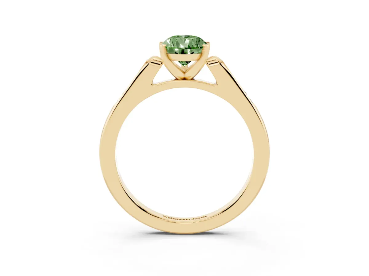 Fancy Green Pear Cut Diamond Solitaire Ring with Channel Set Round Band and Prong Setting Yellow gold