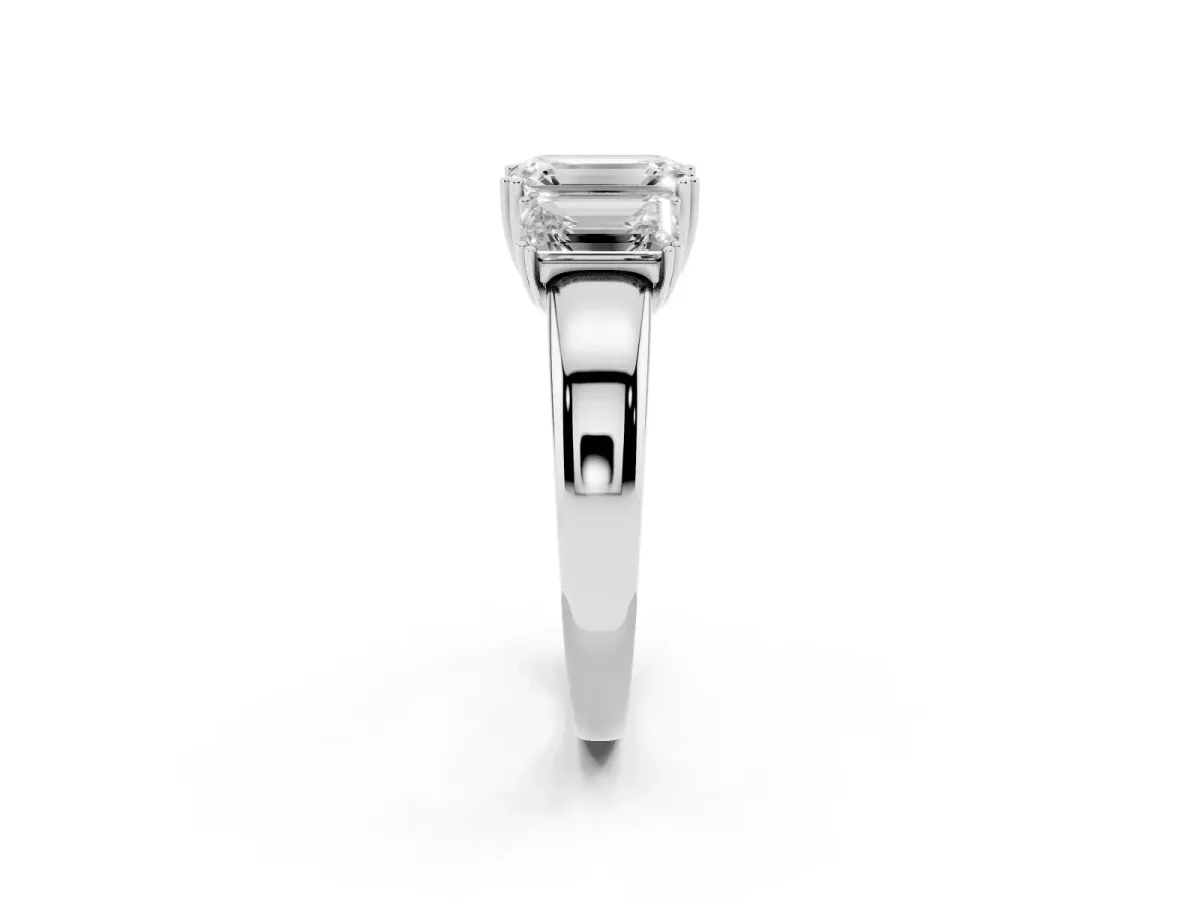 Three-Stone Emerald Cut Cut Diamond Ring with Channel Set Band and Four-Prong Setting Platinum