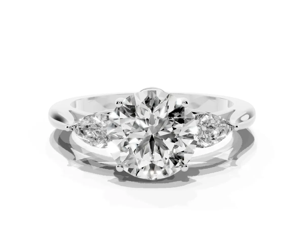 Three-Stone Round Cut Diamond Ring with Pear Side Stones in Four-Prong Setting Silver