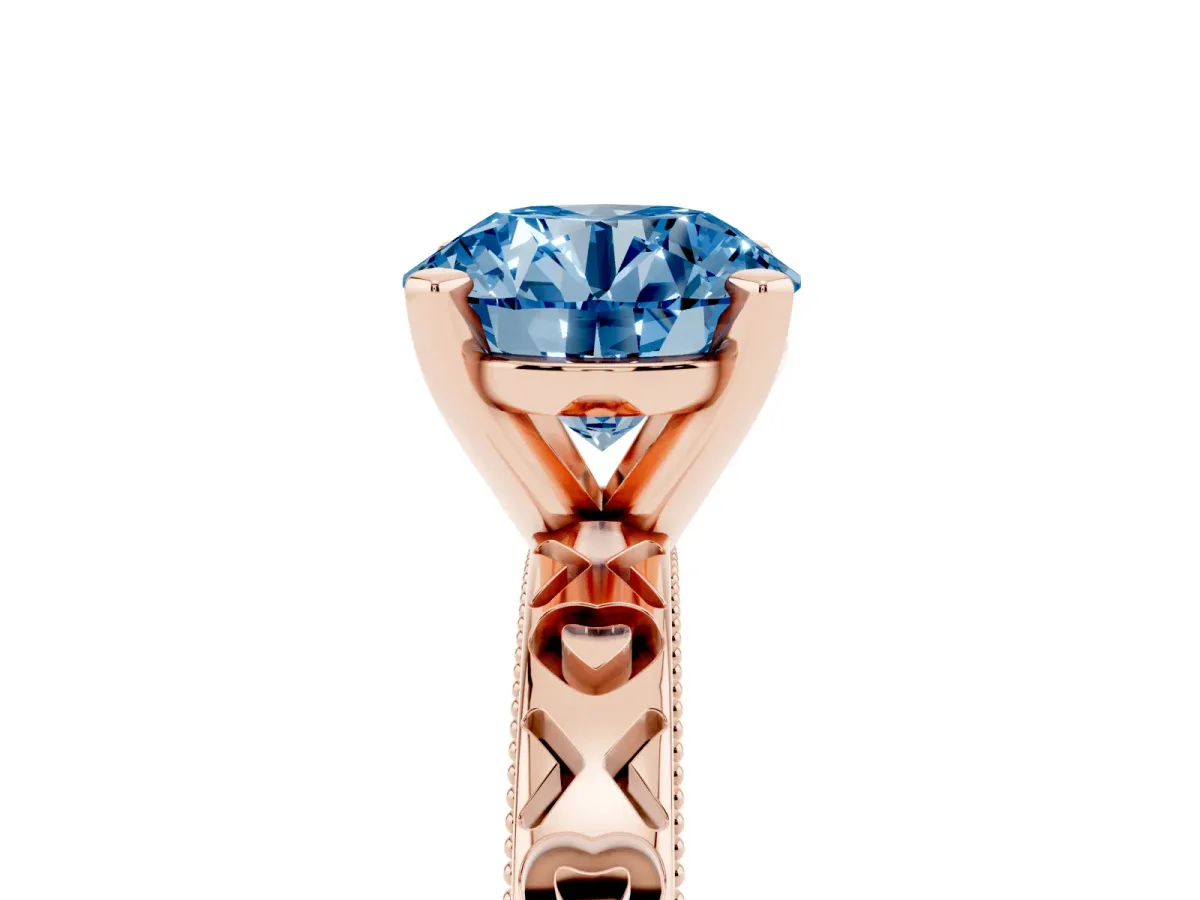 Fancy Blue Round Cut Solitaire Diamond Engagement Ring with XO Engraved Band and Four-Prong Setting Rose gold