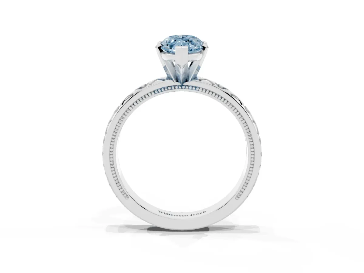 Fancy Blue Marquise Cut Solitaire Diamond Engagement Ring with XO Engraved Band and Four-Prong Setting Silver