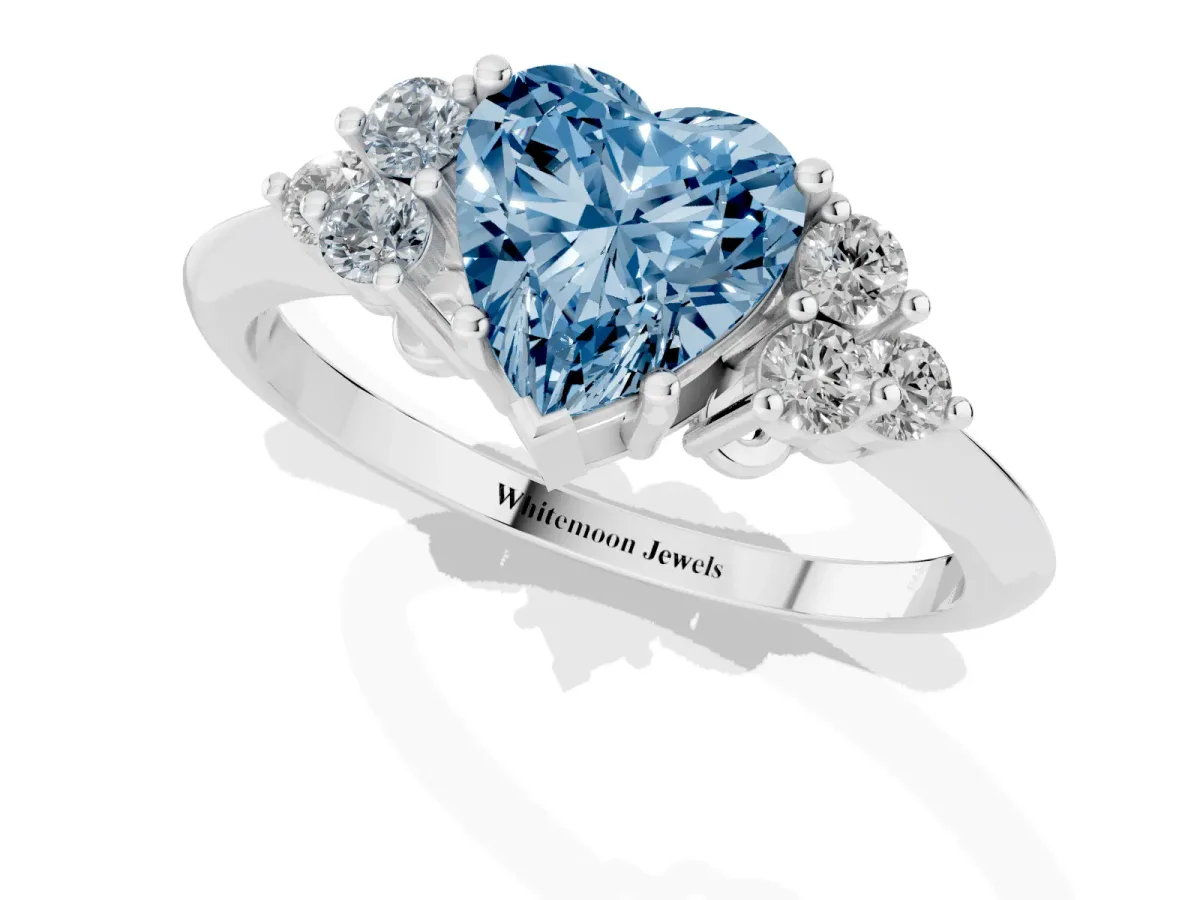 Fancy Blue Heart Cut Cut Diamond Cluster Ring with Solitaire Band and Four-Prong Setting Silver