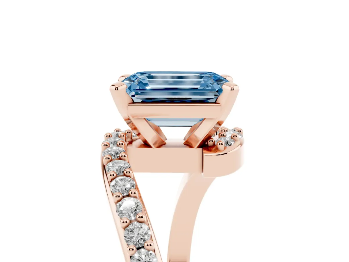 Fancy Blue Emerald Cut Solitaire Twist Band with Pave Set Diamonds and Four-Prong Setting Rose gold