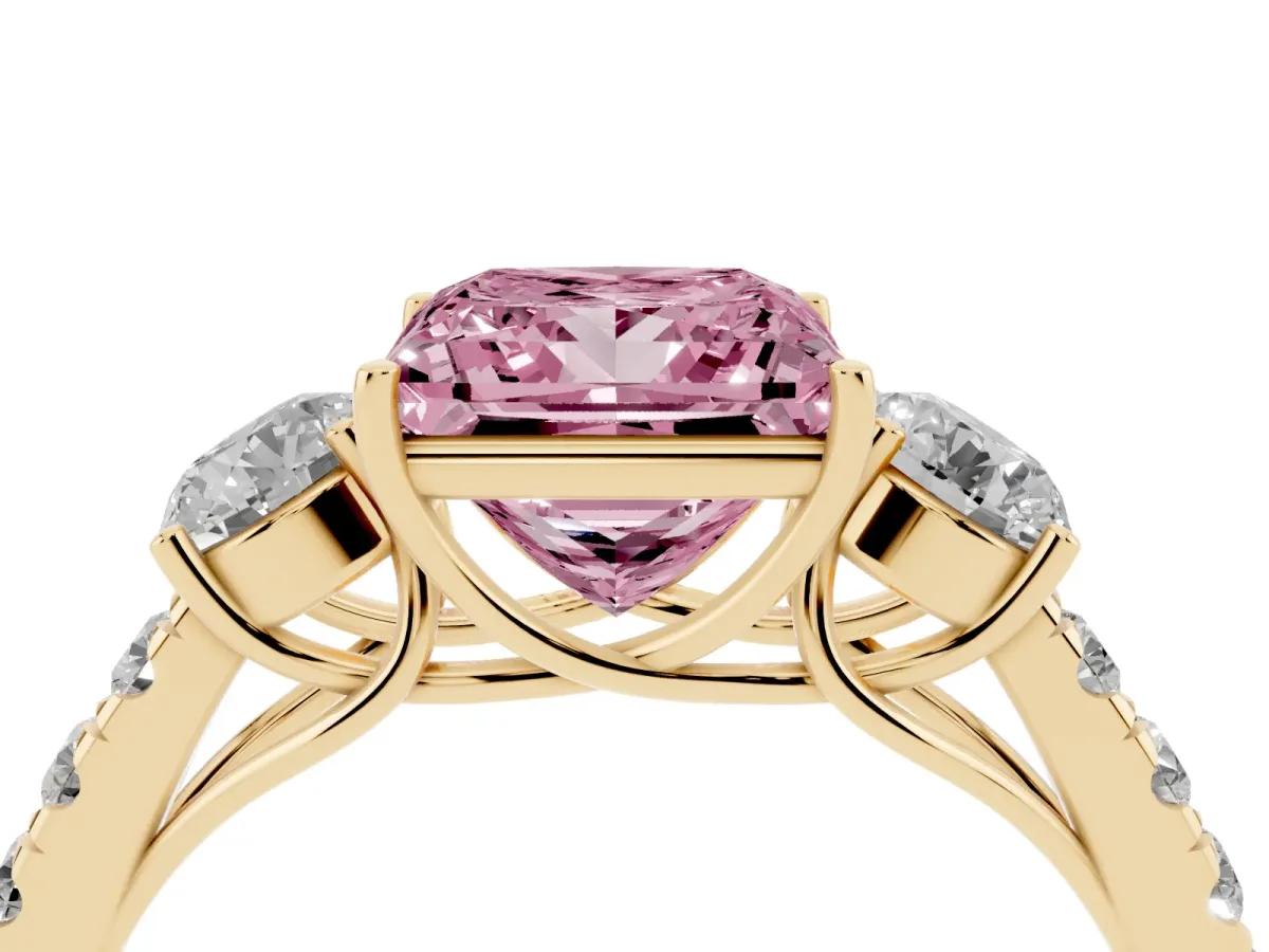 Fancy Pink Princess Cut Cut Diamond Three-Stone Ring with Round Side Stones and Pavé Band Yellow gold